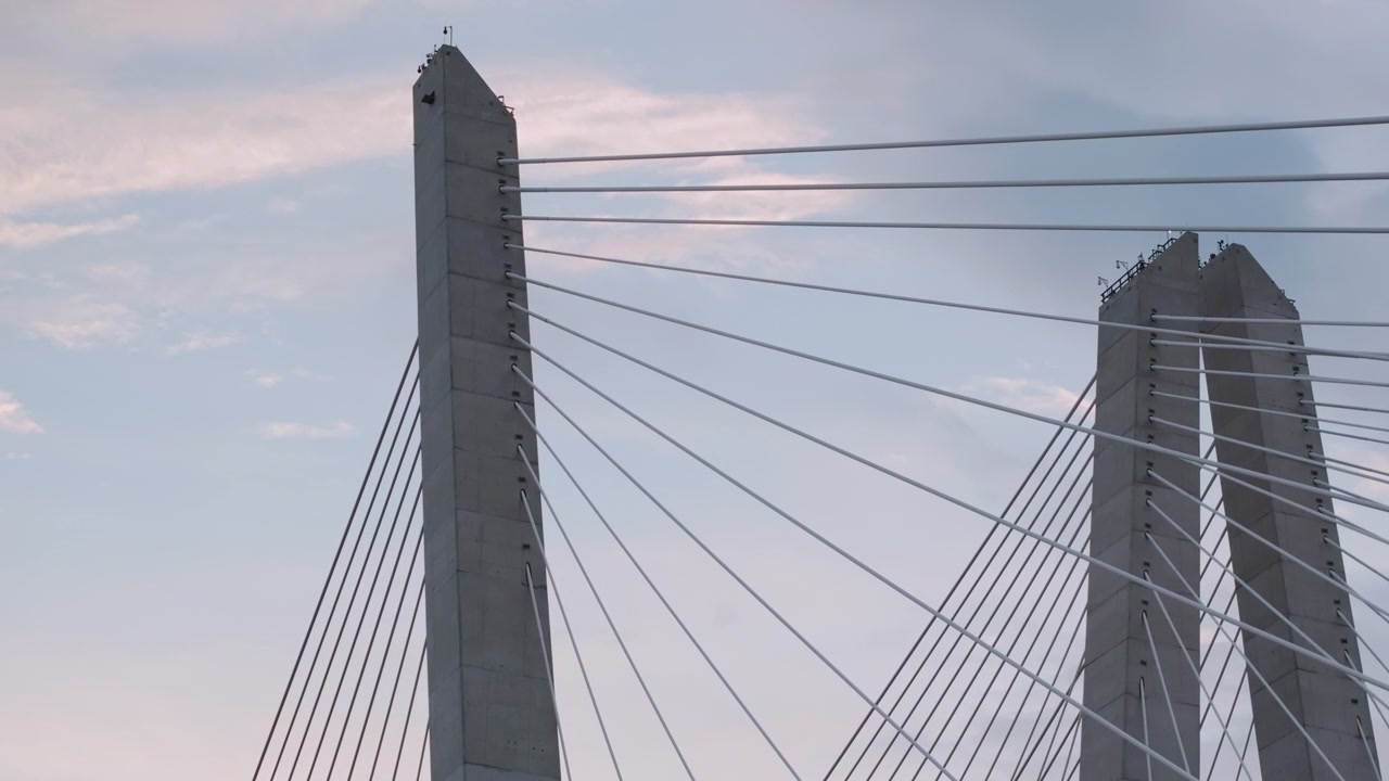 The Tappan Zee Bridge crossing The Hudson River. Shot on an overcast day during the summer.