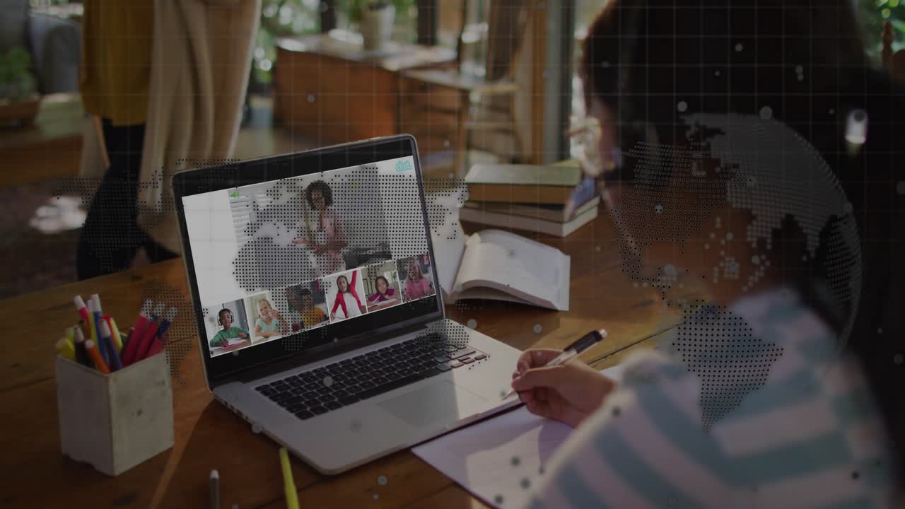 Child following teacher on laptop, writing notes with pencil for online class while grid overlaying
