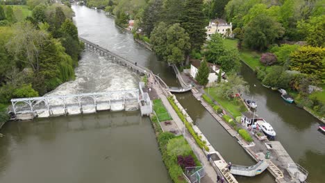 marsh lock and weir near henley on thames uk aerial footage