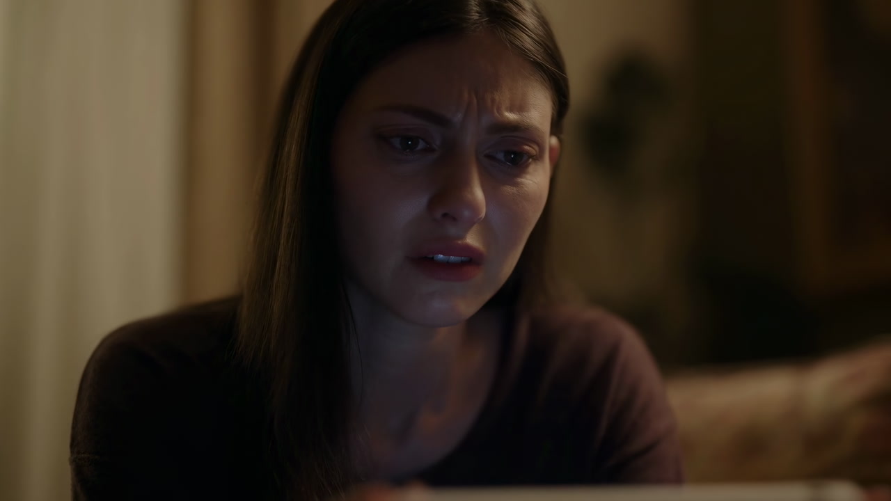 White Woman Reacting To Tablet, Dim Room Glow With Tablet Light, Closeup Portrait With Furrowed Brow And Teary