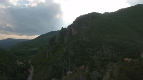 Dark-Cliff-of-a-Mountain-Outside-of-Novi-Pazar-in-Serbia-Europe,-Aerial-Ascending