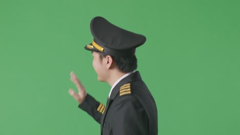 pilot in uniform on green screen