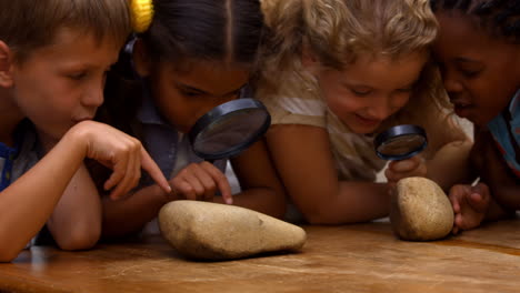 Cute-pupils-in-classroom-at-school