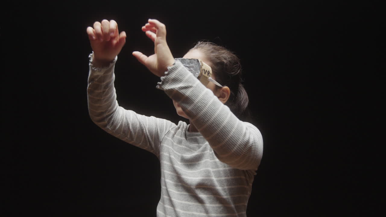 Girl Wears Cardboard and Aluminum Foil Fake VR Headset