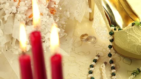 Bride-Shoes-With-Candles-And-Flowers