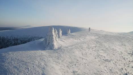 snowy mountain peaks with frozen rock formations