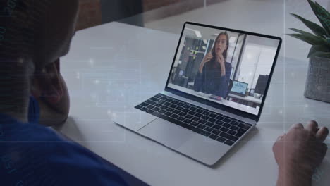 person watching online presentation on laptop with digital data overlay animation