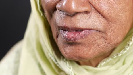 close-up of an older woman's face and lips