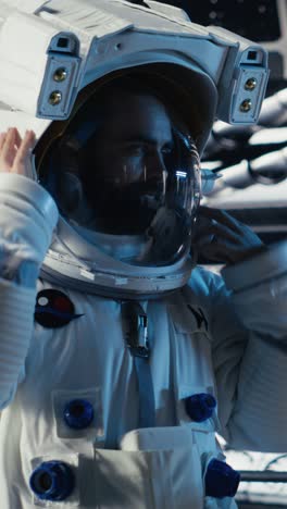 vertical video team of astronauts in advanced technology spacecraft