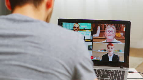 Man-on-a-video-call-with-work-colleagues