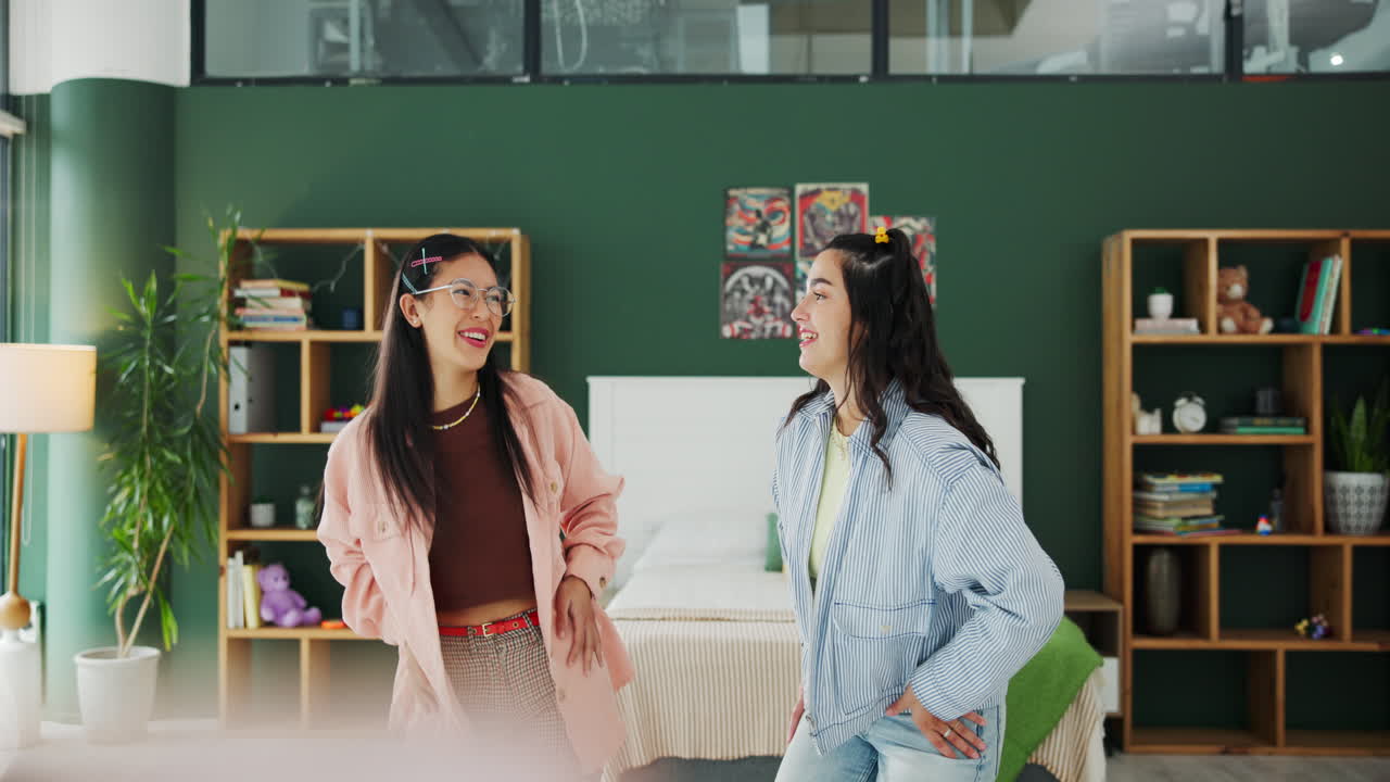Two young women vlogging in a bedroom