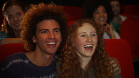 couple watching movie in cinema