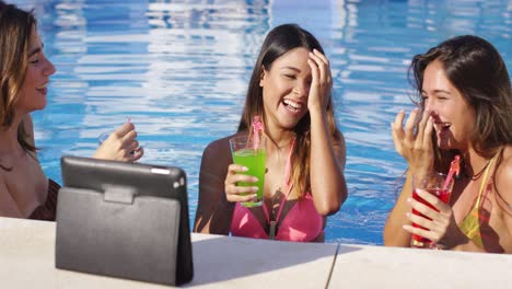 three young women having fun taking selfies