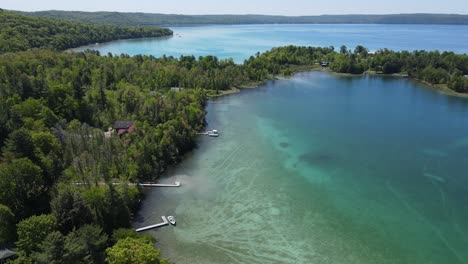 Lakes-merging-in-Michigan-with-private-estates,-aerail-drone-view