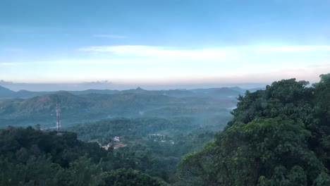 a stunning mountain covered in lush greenery, the winding roads and stunning landscapes make for an unforgettable view