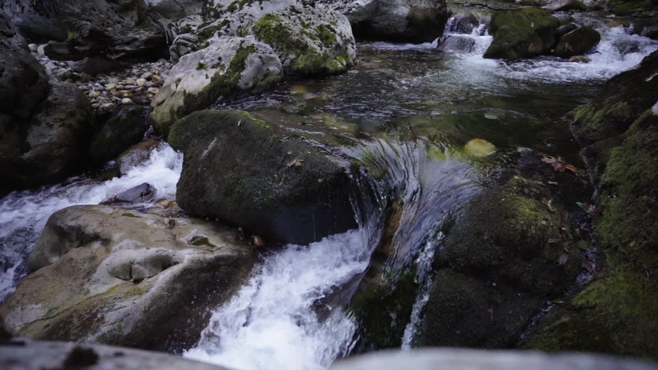 Flowing Aller river stream Asturias Spain in epic slow motion