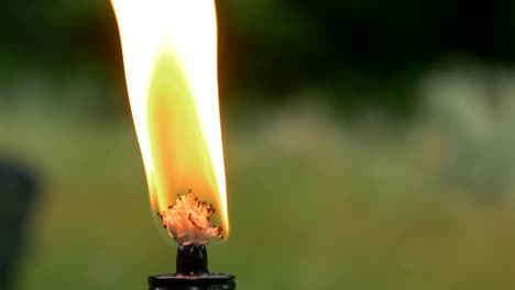 closeup of burning torch in slow motion