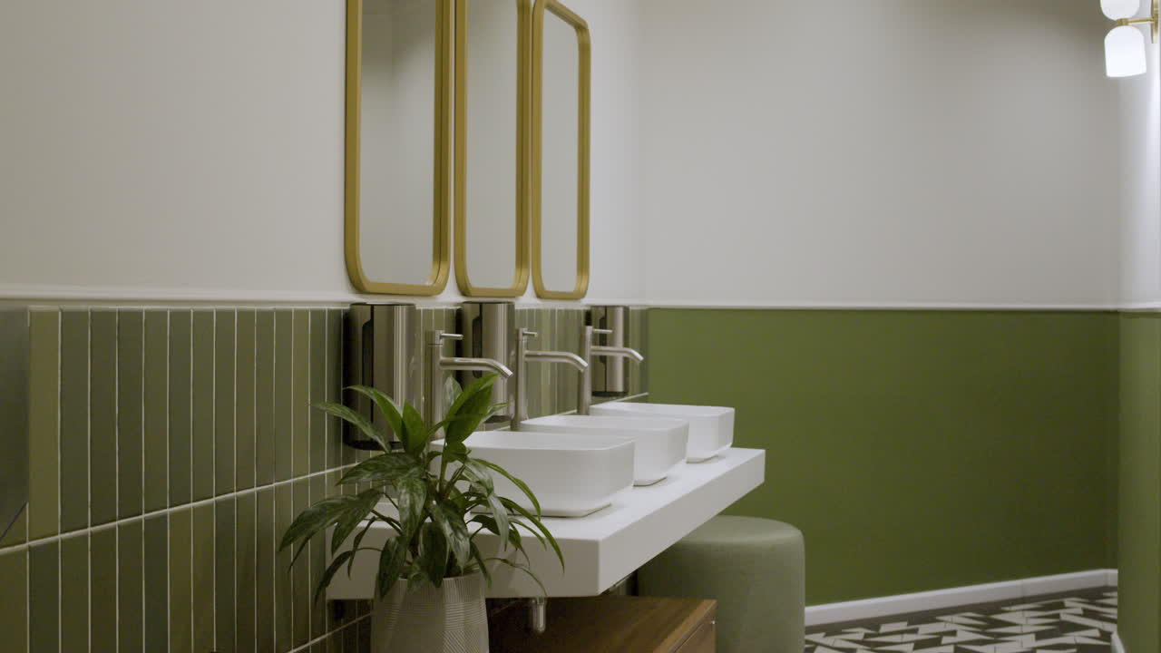 Modern Public Bathroom with Green and White Design