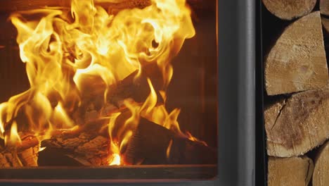 Close-Up-Flames-From-Fire-Made-From-Logs-In-Wood-Burning-Stove-At-Home-11