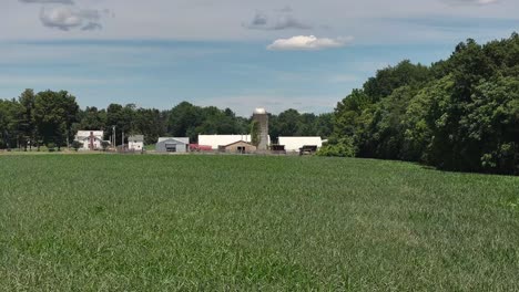 drone view of farm and silo in upstate new york 4k