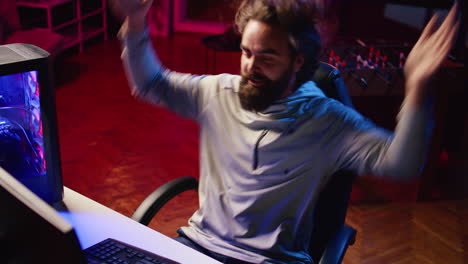 competitive pro gamer raging after failing to win online multiplayer esports match, feeling annoyed