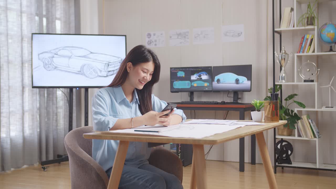 Young woman working on car design in a home office