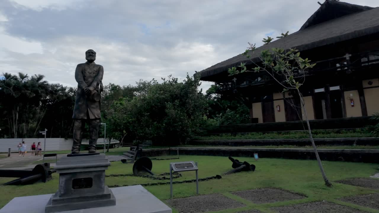Historical Park with Statue, Maritime Artifacts, and Observation Tower