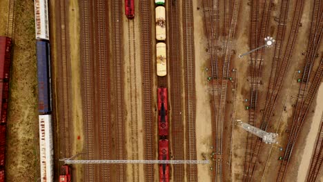 aerial view of colorful freight trains with goods on the railway station-1