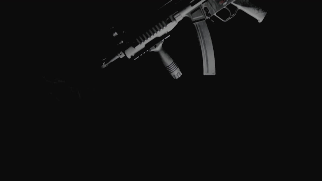 Machineguns on the dark background are falling in slowmotion