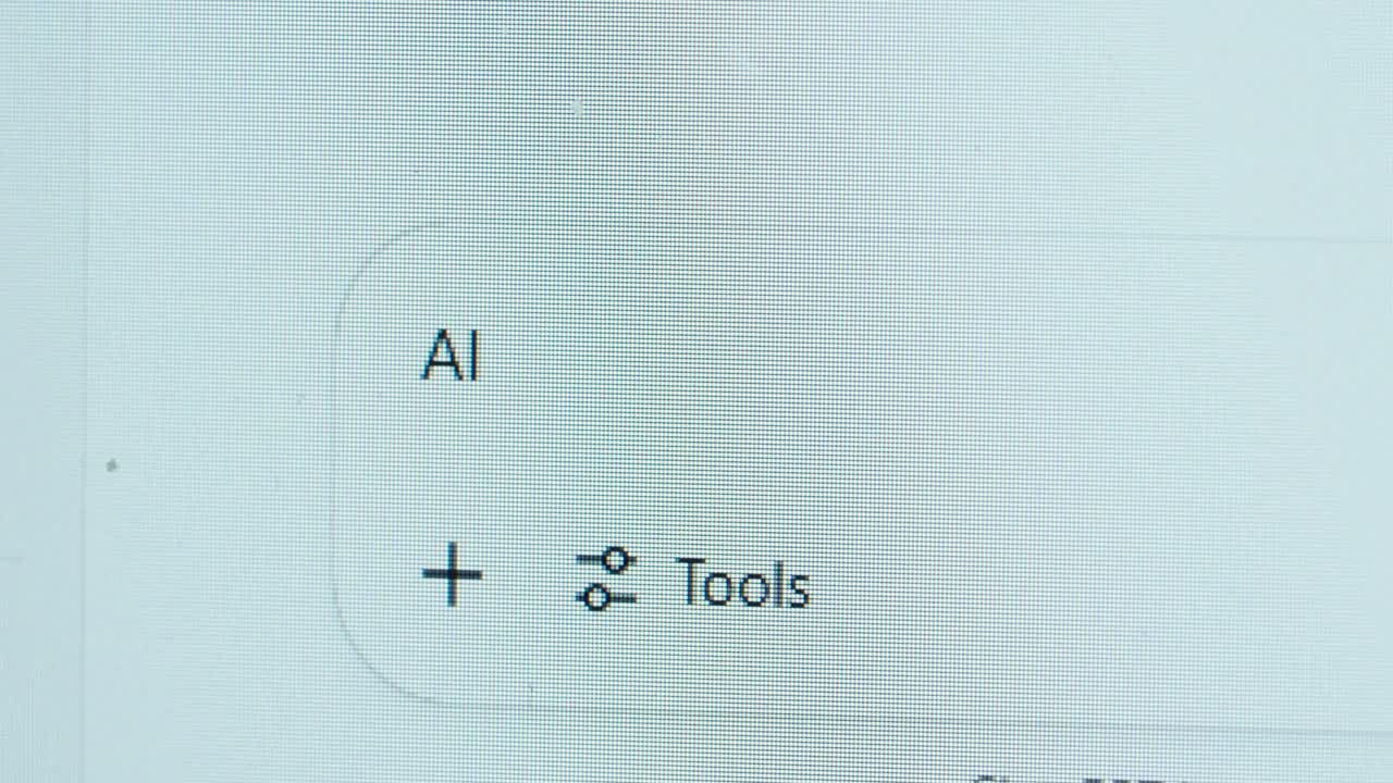 Close-up of a chat interface showing “AI” and a tools icon, indicating that artificial intelligence features are enabled and ready to assist the user