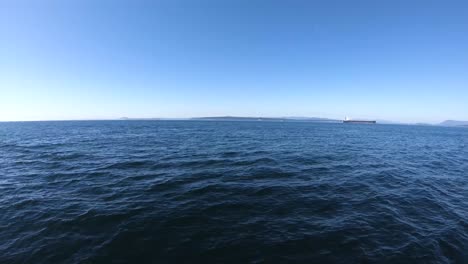 sailing through blue waters in the pacific ocean