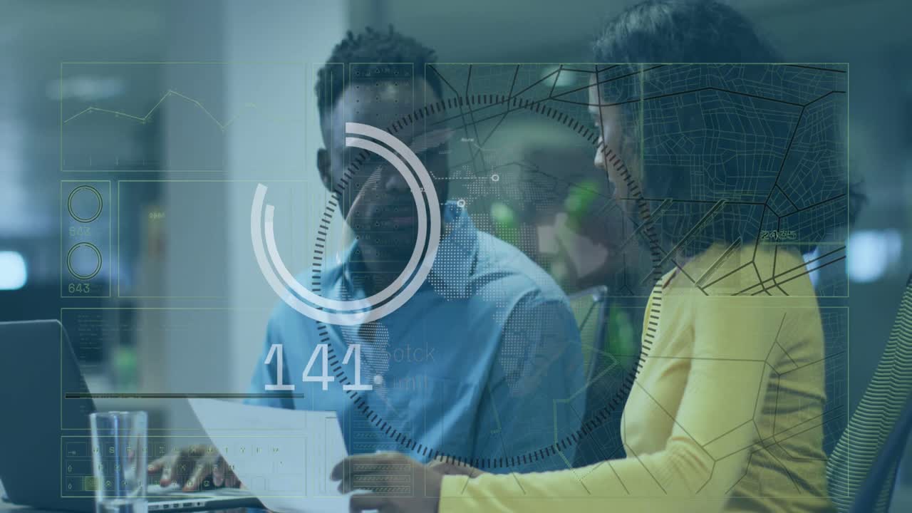 Animation of data processing over diverse man and woman discussing over documents at office