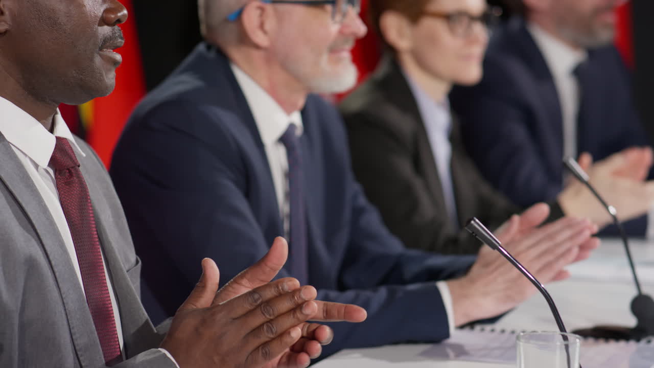 Diplomats Clapping Hands at Press Conference