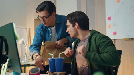 eyeglasses man bringing takeaway food for lunch break. guy anticipating dinner