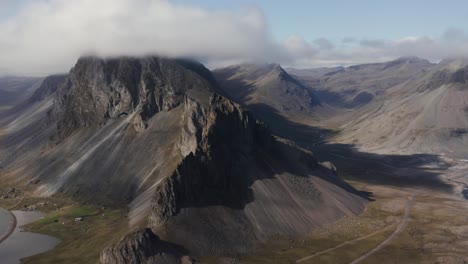 famous iceland volcanic mountain range at hvalnes peninsula, aerial