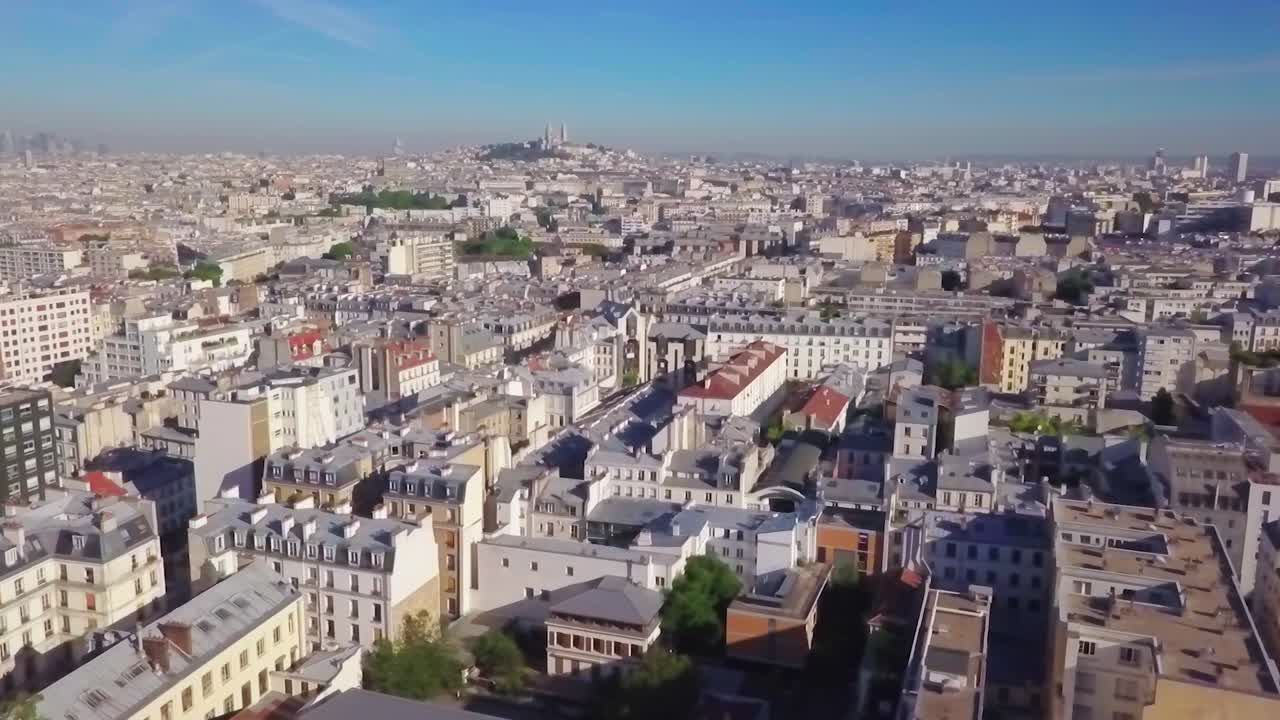 Urban neighbourhoods and streets of downtown Paris, France. Aerial flyover