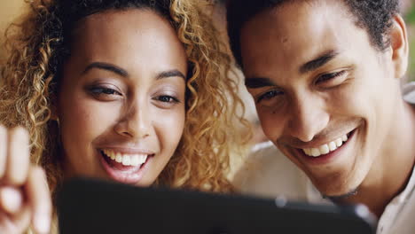 couple using digital tablet touchscreen ipad watching movies