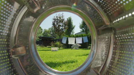 laundry day view through washing machine