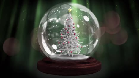 Animation-of-snow-globe-with-christmas-tree-over-glowing-multi-coloured-spots