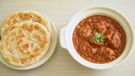 chicken-tikka-masala-spicy-curry-meat-food-with-roti-or-naan-bread---Indian-food-style
