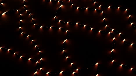 candy cane string lights on a dark background