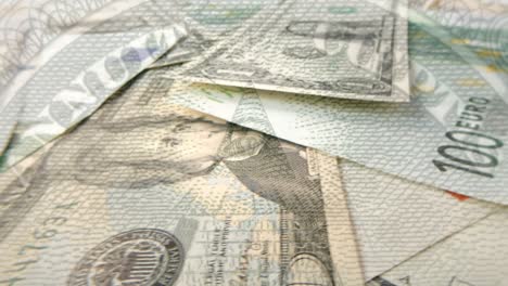 rotating dollar and euro banknotes of various denominations close-up with a pyramid and the glowing mason eye on top. pyramid on a banknote of 1 us dollars. 4k macro raw video.