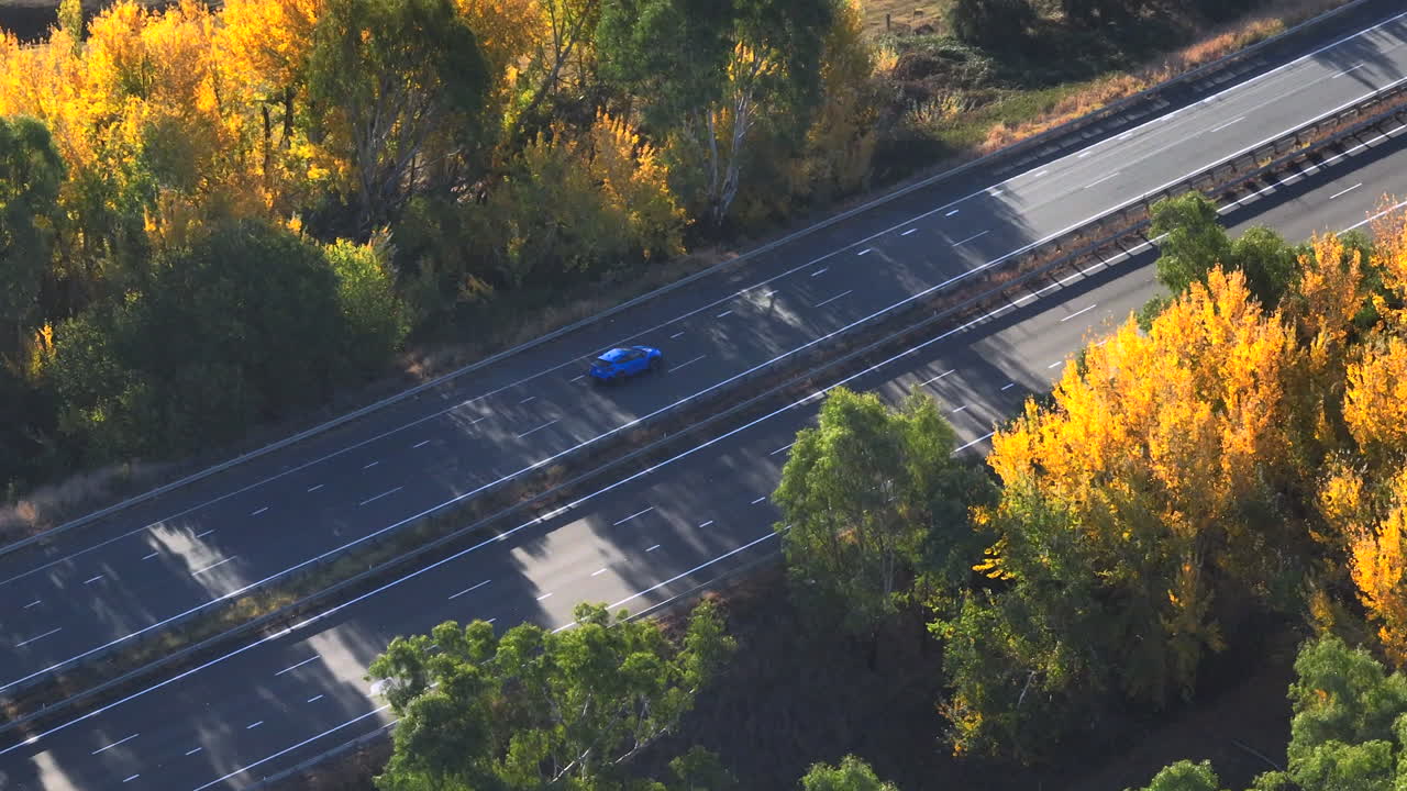 Drone footage showing trucks and vehicles on the Hume Highway as it passes near Gundagai in New South Wales, Australia