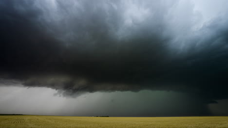 massive storm clouds over a wheat field