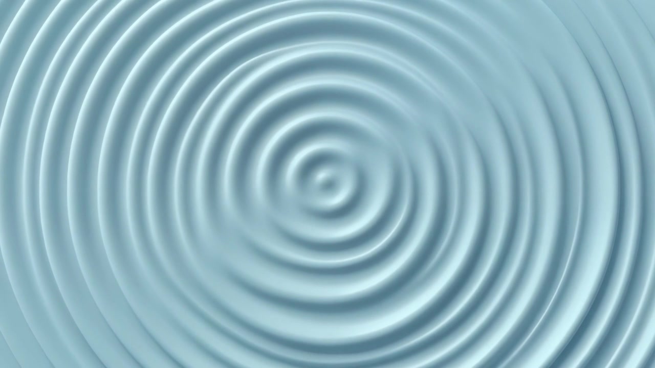 Concentric Ripples Expanding on a Smooth Light Blue Surface
