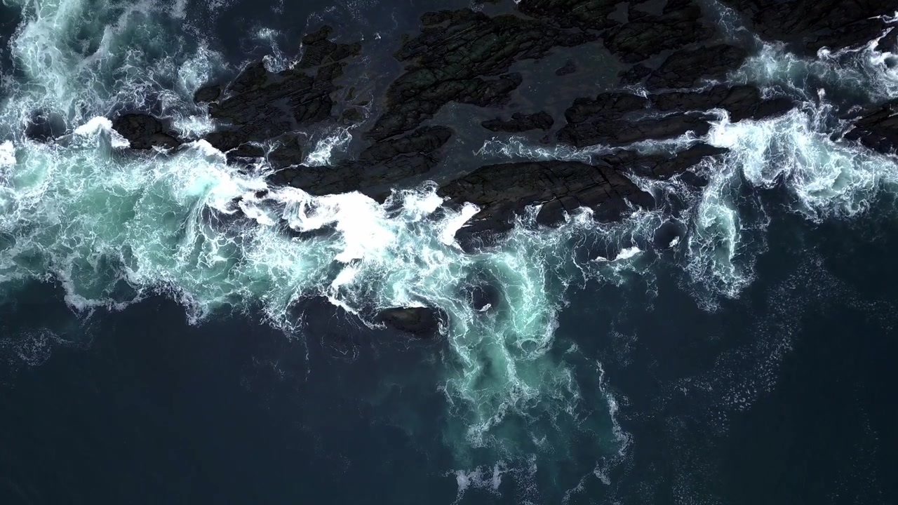 Waves Crashing on shallow rocks