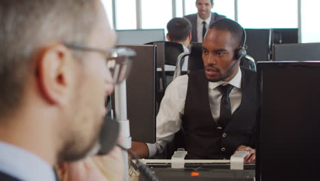 view of staff in busy customer service department