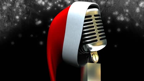 animation of snow falling over microphone with christmas hat on dark background