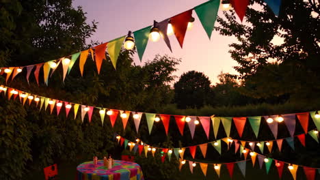 colorful string lights and pennant banners at a garden party