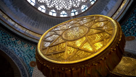 golden decorative disc in a mosque